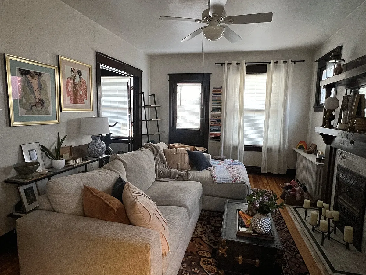 Living room, door to front balcony patio - 1248 N Pennsylvania St #3