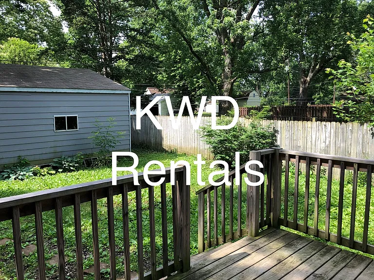 fenced-in back yard