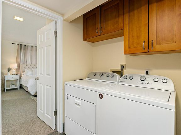 Full size Whirlpool washer/dryer, in unit.