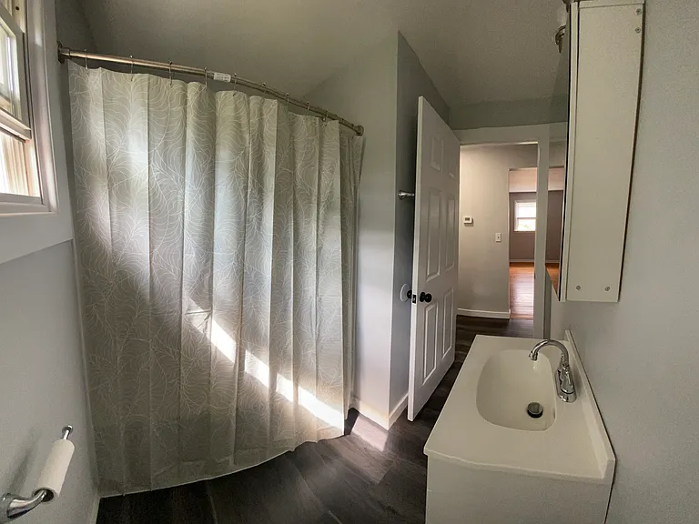 Bathroom with shower curtain