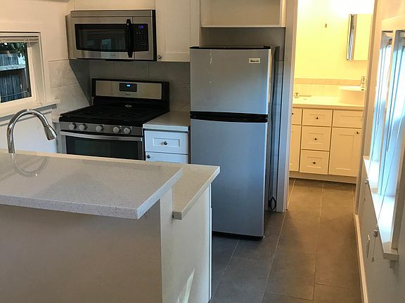 Kitchen and Entrance to Bathroom to the Right