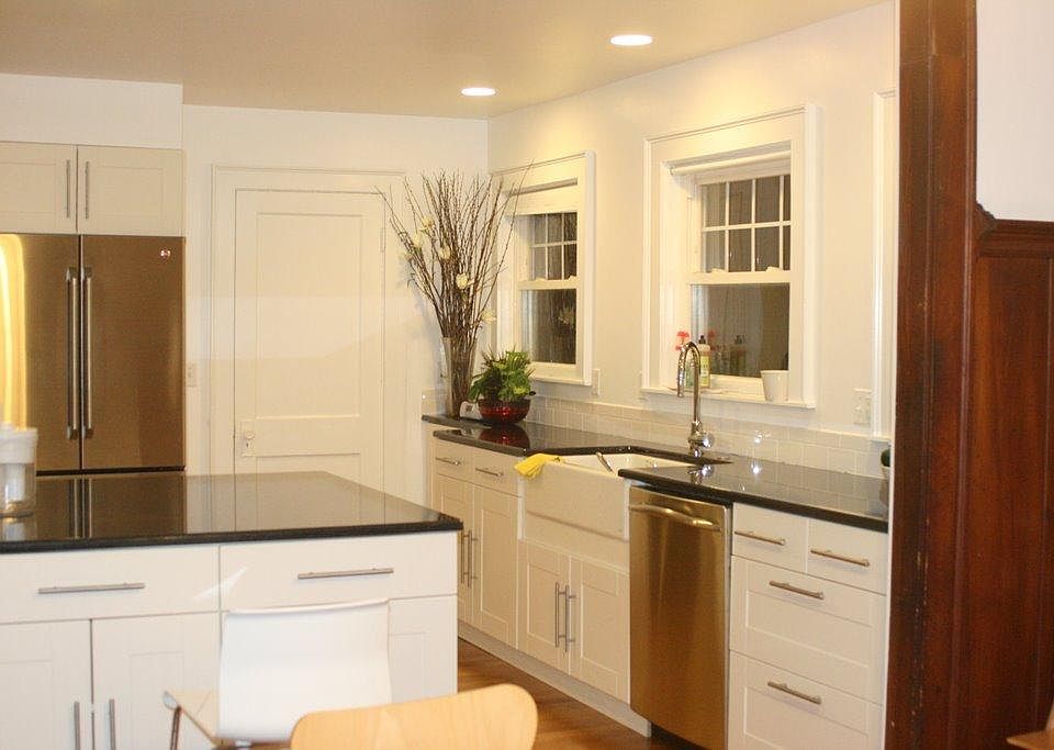 Open kitchen plan. All stainless appliances, including gas oven range and vented microwave, not shown in photo.
