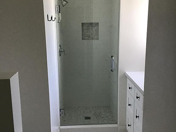 new full bathroom with separate shower and tub!