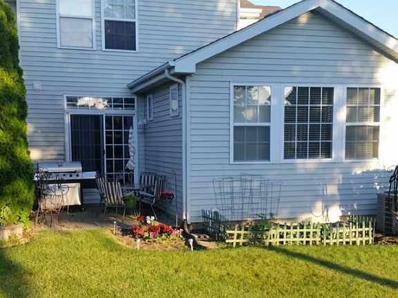 Exterior backyard-largest lot; garden and patio