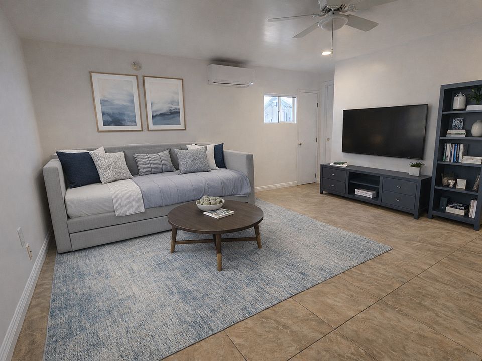 Staged photo of living room. Furniture is not included.