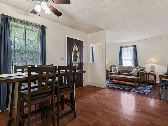 To the left of your entry your find the perfect living room open to the dining room for entertaining.