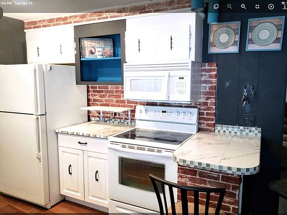 The kitchen is fully equipped