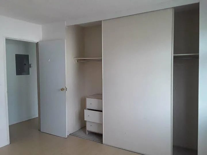 Large Closet with two moving panels in the bed room