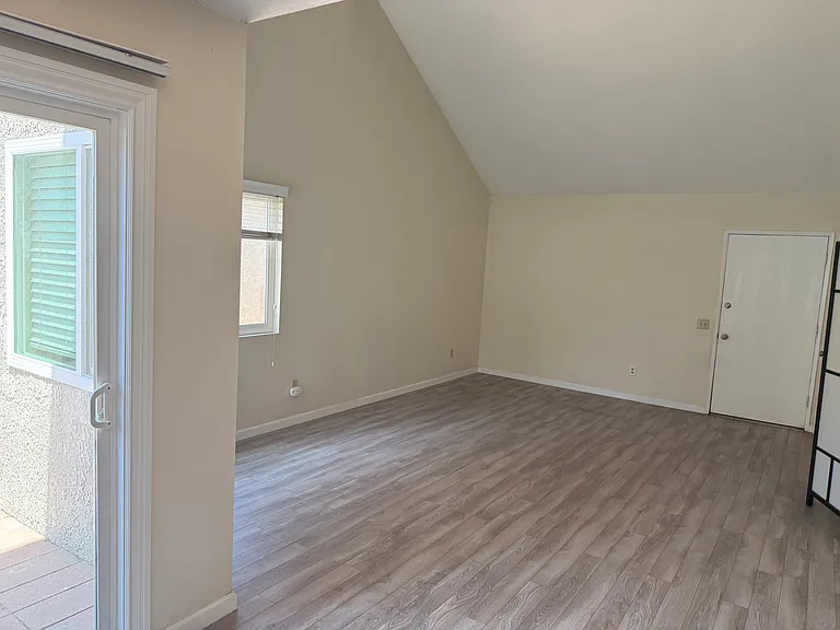 First floor living room with ample sunshine.