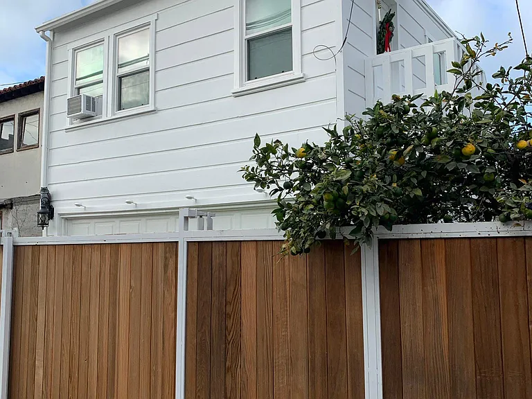View from alley, showing security gate