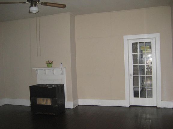 Den with natural gas heater