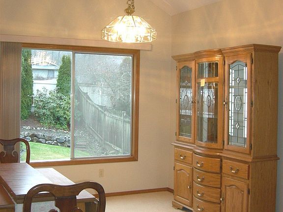 Formal Dining room with vaulted ceilings and fresh paint
