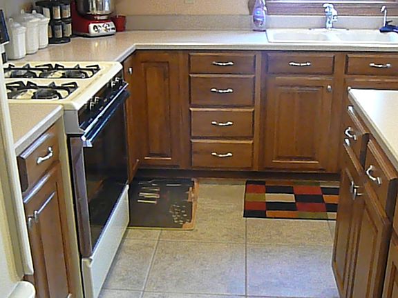 Kitchen cabinets and real tile floor