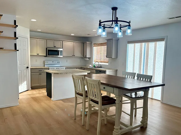 Dining area with view of kitchen