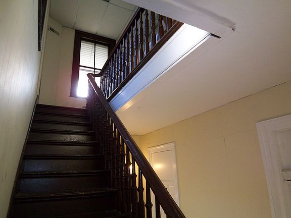 Nice original stairs lead to second floor where this #3 apt