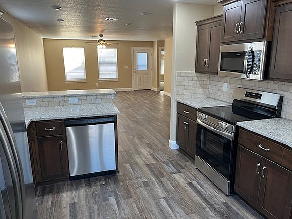 Kitchen (view into living area)