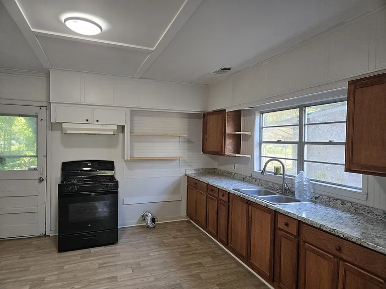 tons of cabinet space and open shelving