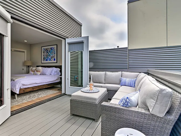 Sofa-style seating in the master bedroom deck creates an incredible vibe.
