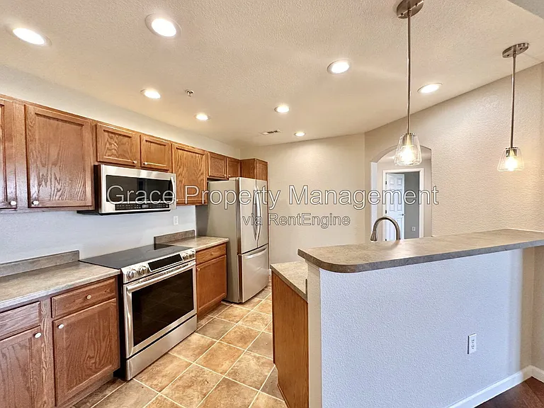 5735 N Genoa Way #306 — Photo 3