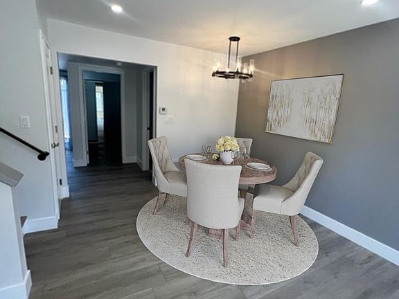 Formal dining room with dimmable chandelier