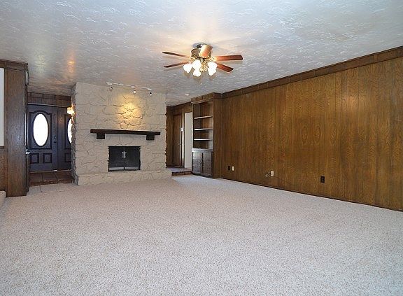 Entry into Living room with Fireplace