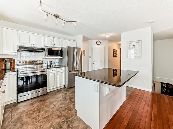 5th image of 157 N Hawkstone Mnr NW