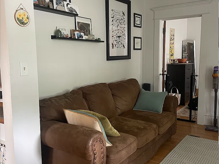 Living room. (This couch comes with the apartment if the new tenant wants it!)