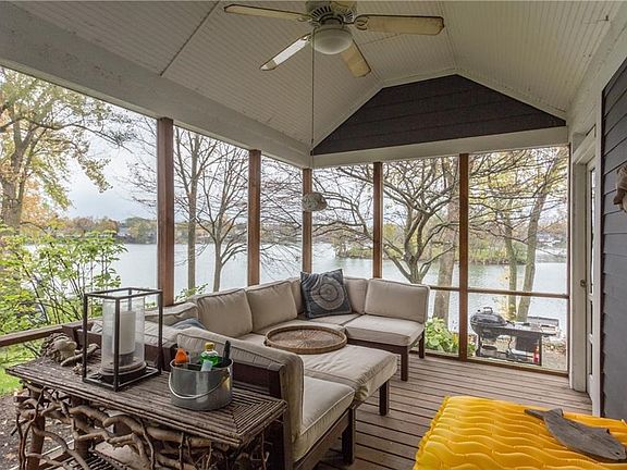 Beautiful screened porch overlooking the water