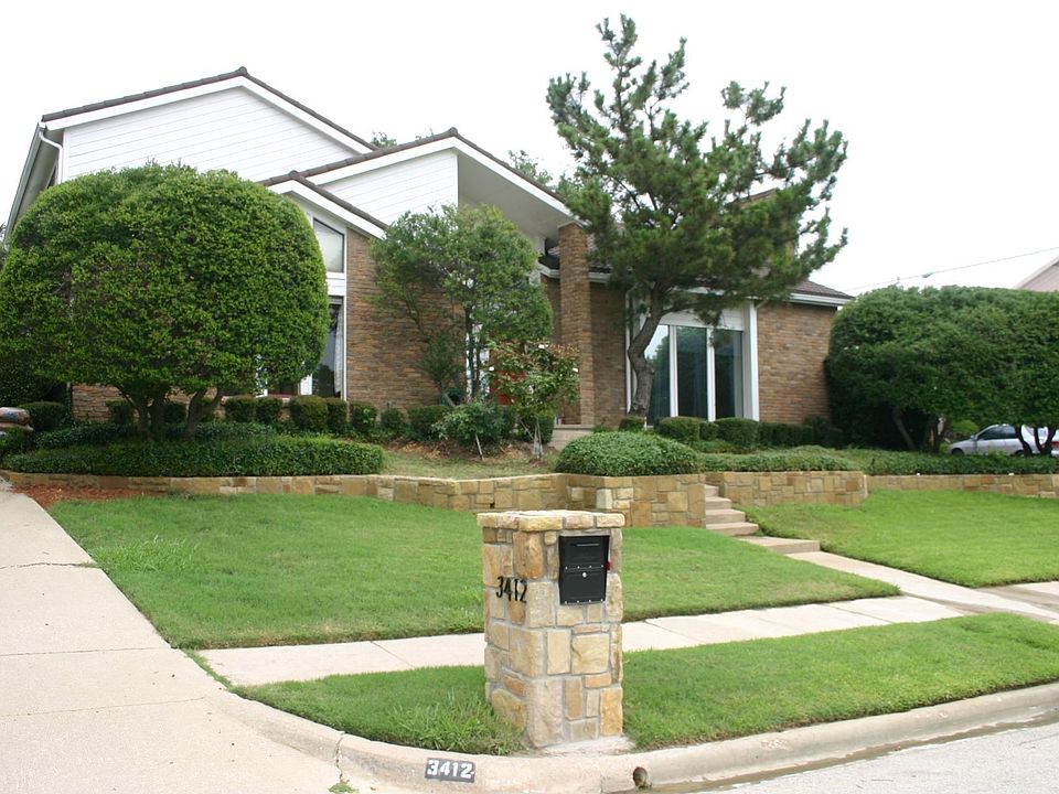 Stone retaining wall and mailbox