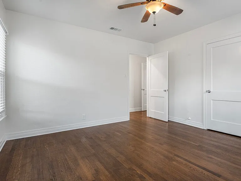 Bedroom With Lots Of Light And Views Of Back Yard.