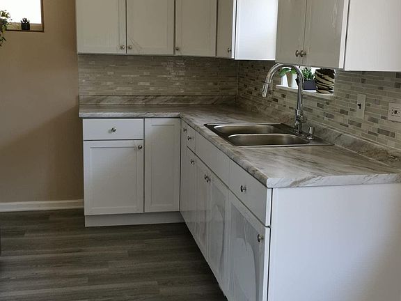 5th image of 8717 Trumbull Ave