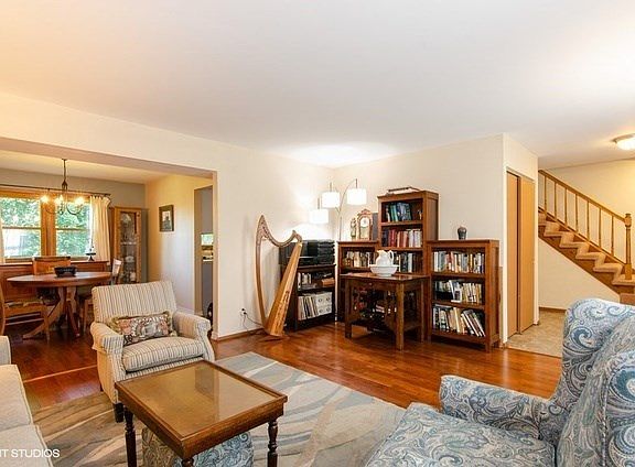 Just off the front door flowing to dining room and into kitchen.