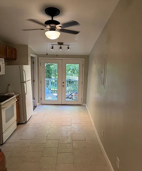 Entrance off the large deck into the large kitchen (2nd fl).