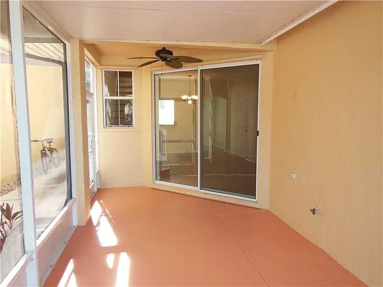 Screened backyard patio.
