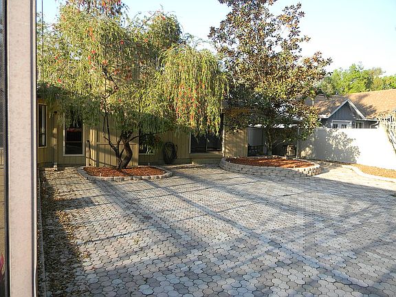 Large paver area & carport