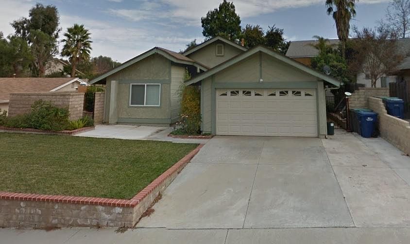 Two car garage and parking for a boat or small RV.