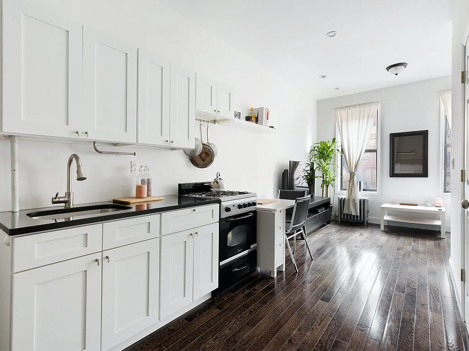 1st image of 204 E 7th St APT 12