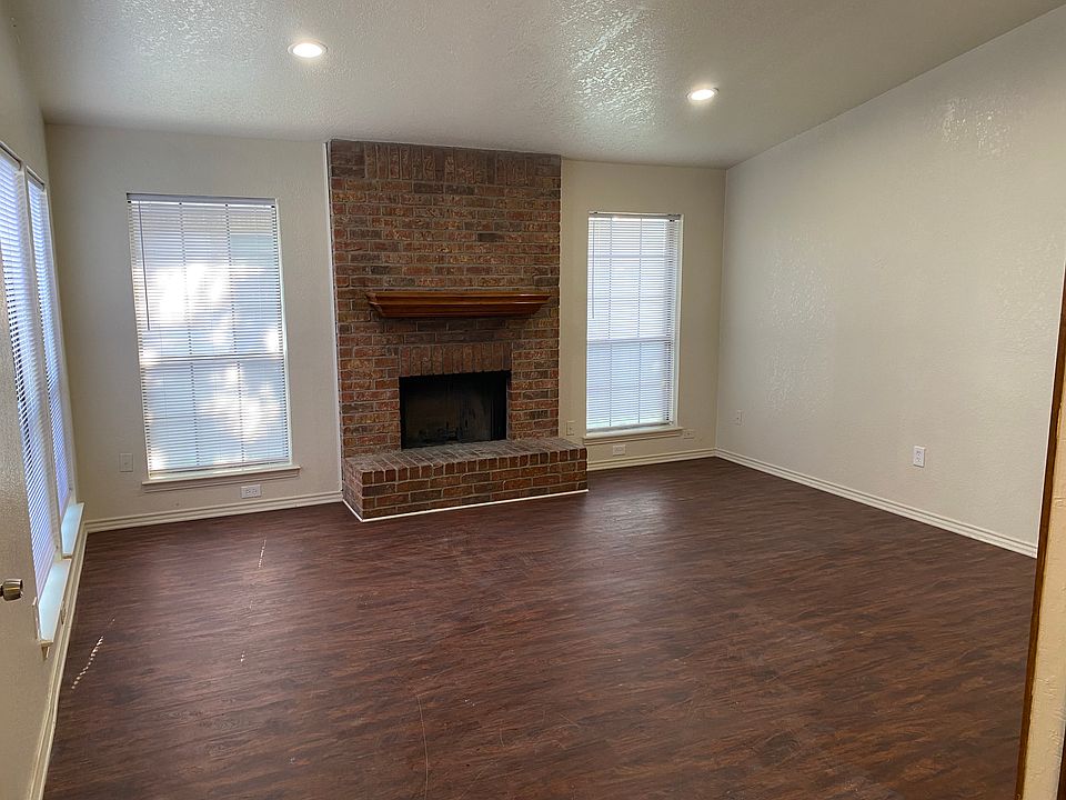 living room with vaulted ceilings
