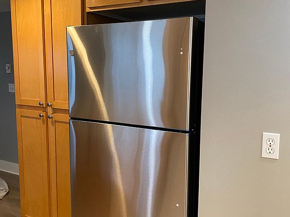 Brand new refrigerator and plenty of storage and cabinet space.