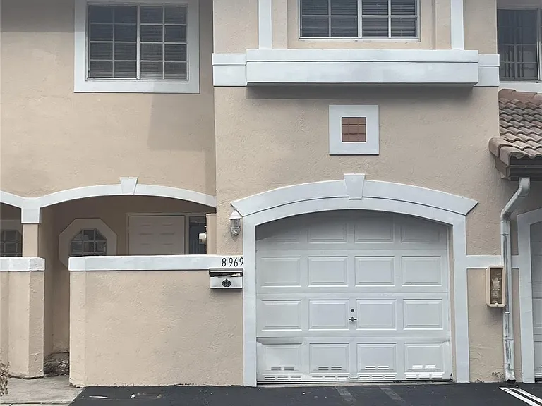 8969 NW 38th Dr — Photo 1