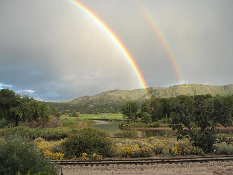 Rainbow in valley view