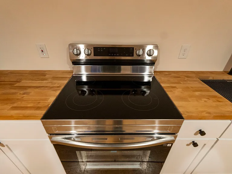 Good quality stainless steel appliances, and a clean modern kitchen