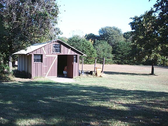 View of out building in backyard