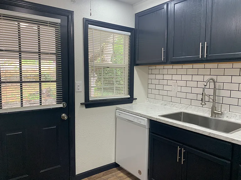 View of entrance and partial kitchen view
