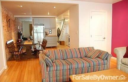 Open kitchen leading into back LR