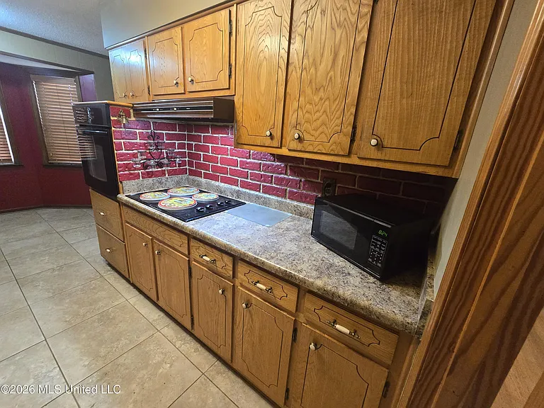 8209 Claiborne Dr — Photo 11