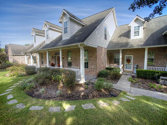 Another view of front elevation and porches.
