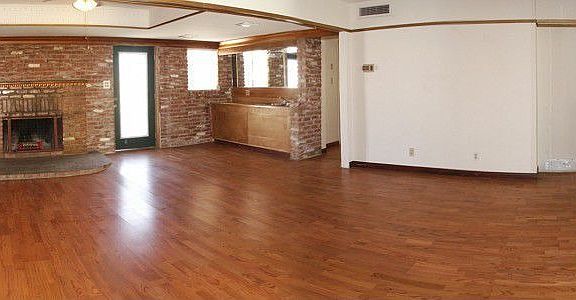 Huge Living Room w/ Brick Fireplace 