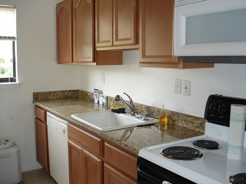 Maple cabinets and granite counter top! Appliances are 2 years old/barely used