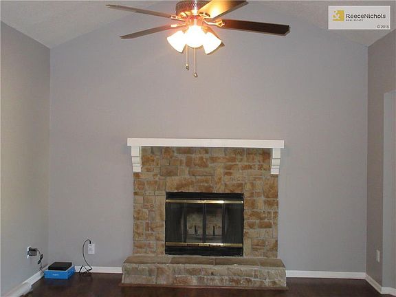 Nestled just next to the stone fireplace is your Google Fiber box!